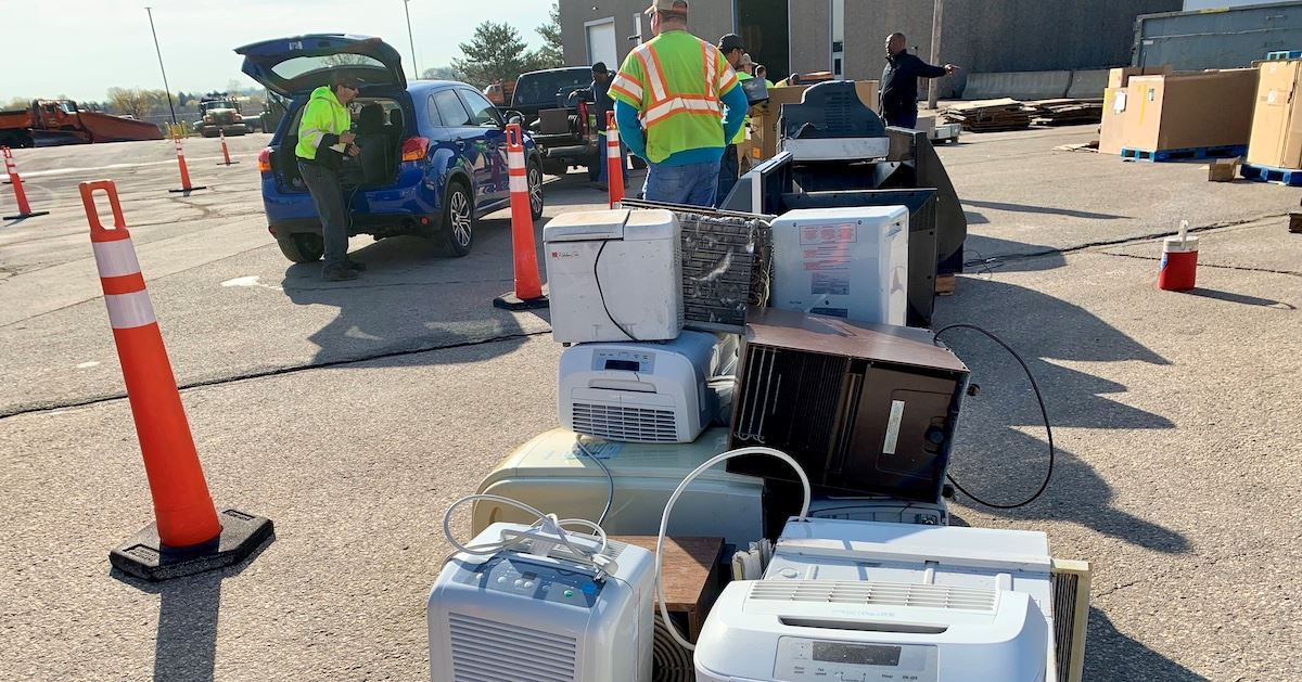 Vehicles lined up to dispose of items at Kenosha County's Household Hazardous Waste collection ev