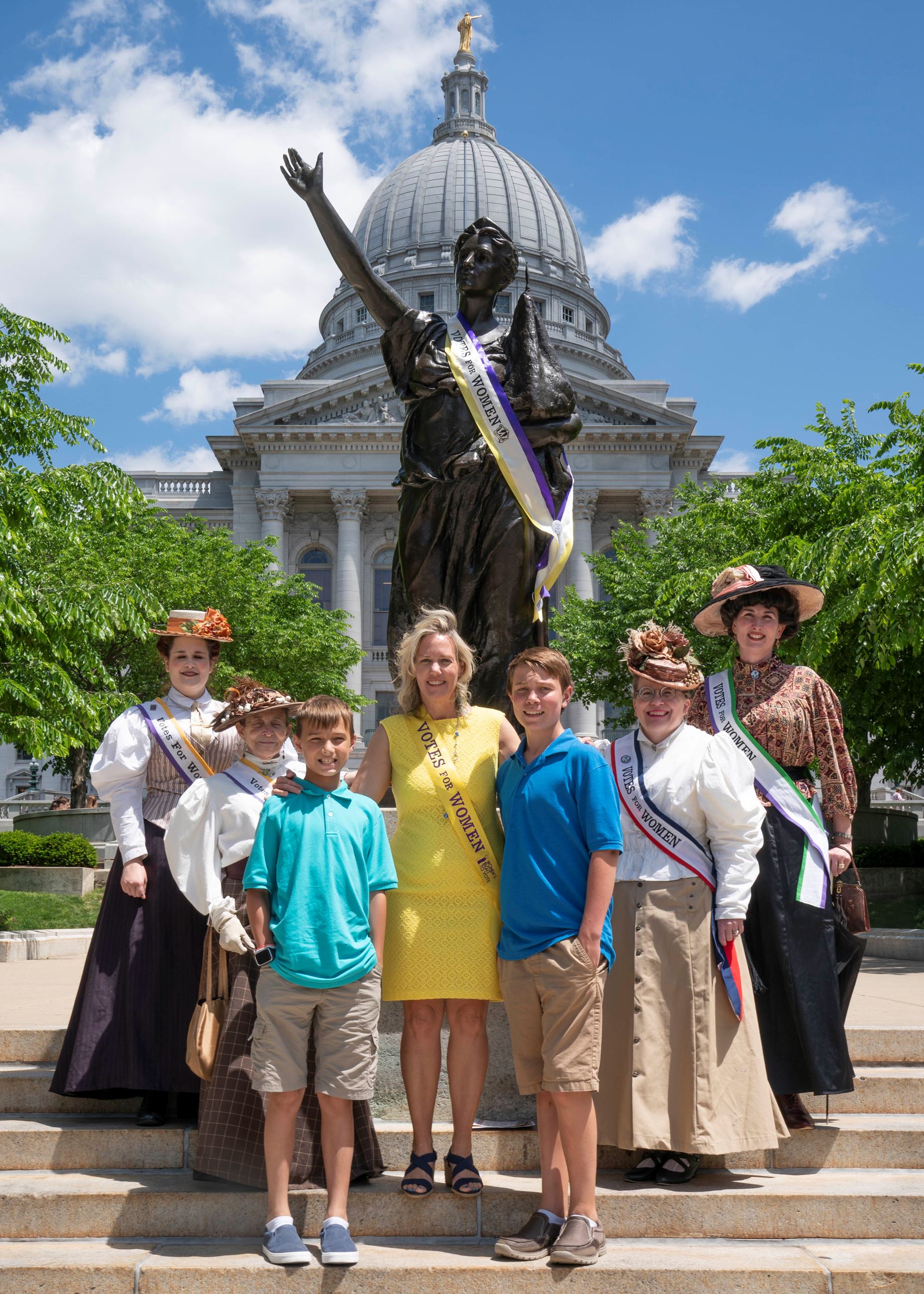Samantha Kerkman and her sons celebrating the 19th Amendment at the state Capitol